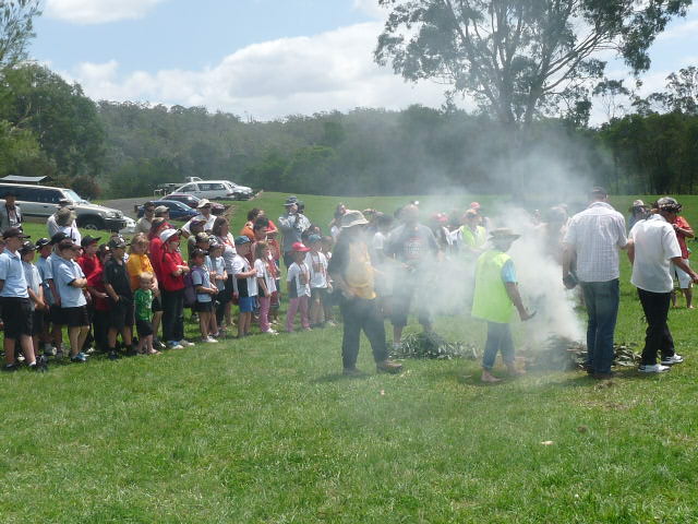 Elders walk through Smoking Ceremony